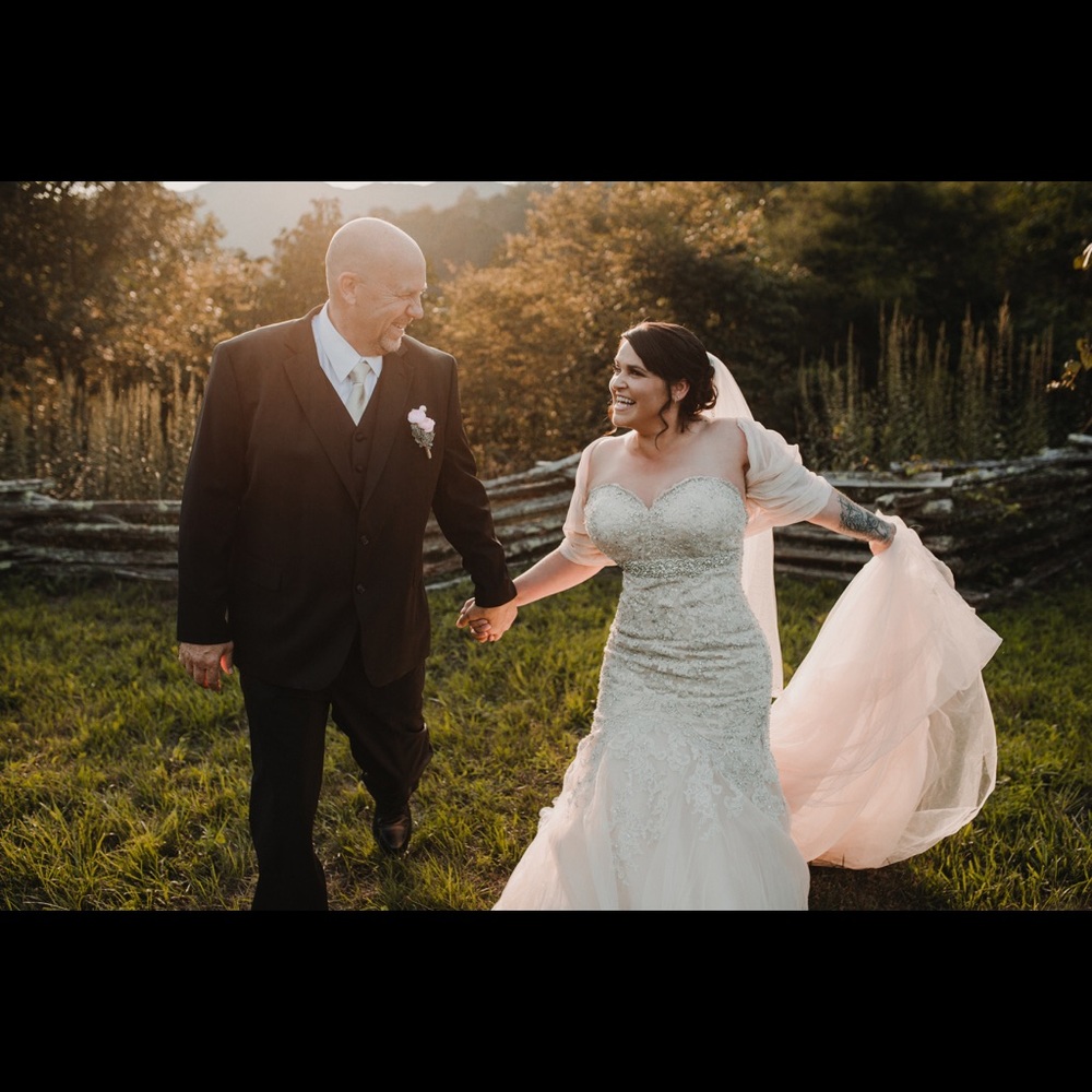 Custom made wedding dress. Worn once size 12